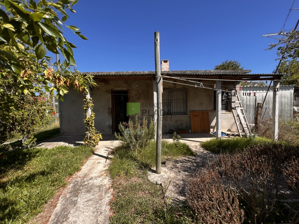 Casa ID.778 - Casa de 2 Dormitorios, cochera y patio