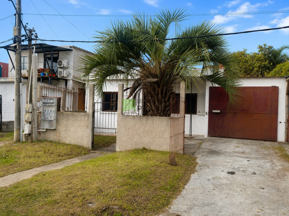Casa ID.1067 - Casa de 2 dormitorios con Garage en Barrio Lavalleja en Alquiler