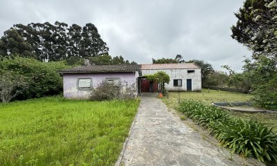 Casa y Galpón con buen terreno