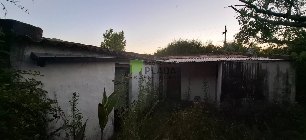 Terreno ID.1079 - Amplio Lote en El Edén con construcciones, frente a dos calles, pegado a la Capilla.
