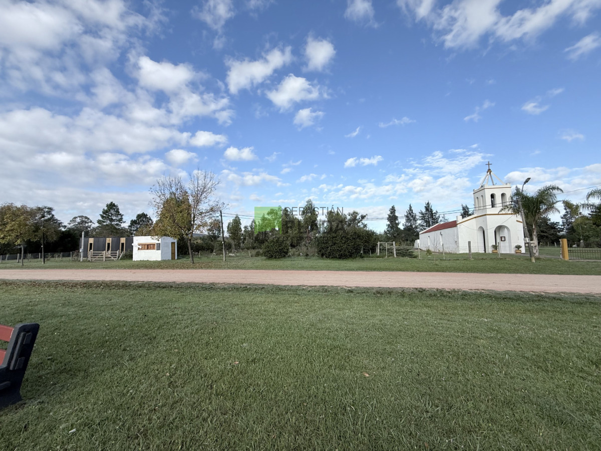 Terreno ID.1079 - Amplio Lote en El Edén con construcciones, frente a dos calles, pegado a la Capilla.