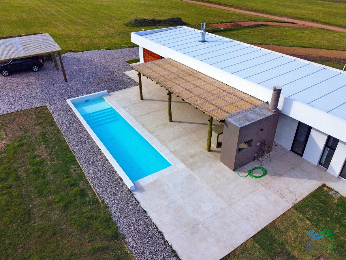 Casa ID.4341 - Vendo casa a estrenar, 3 dormitorios en suite, piscina, en barrio privado Laguna de los Cisnes, Laguna del Sauce, Punta del Este