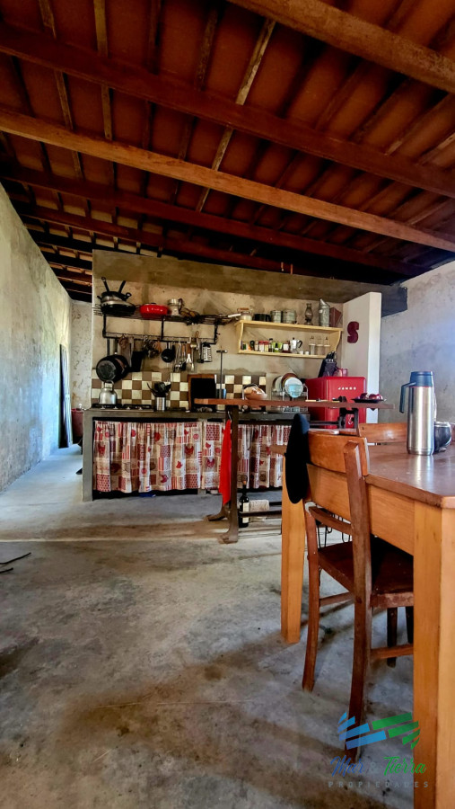 Chacra ID.4356 - BAJO DE PRECIO !!! Muy linda casa de piedra, 9 has en las sierras y con 500 olivos