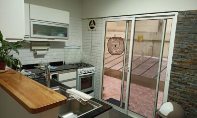 VENTA APARTAMENTO LIVING COMEDOR DOS DORMITORIOS DOS BAÑOS COCINA DEFINIDA PATIO GARAGE POCITOS