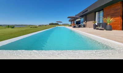 Magnifica casa de 2 dormitorios, 5000 metros de terreno, piscina, losa radiante