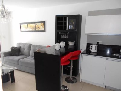 Unique dormitorio y medio - Edificio full servicios.