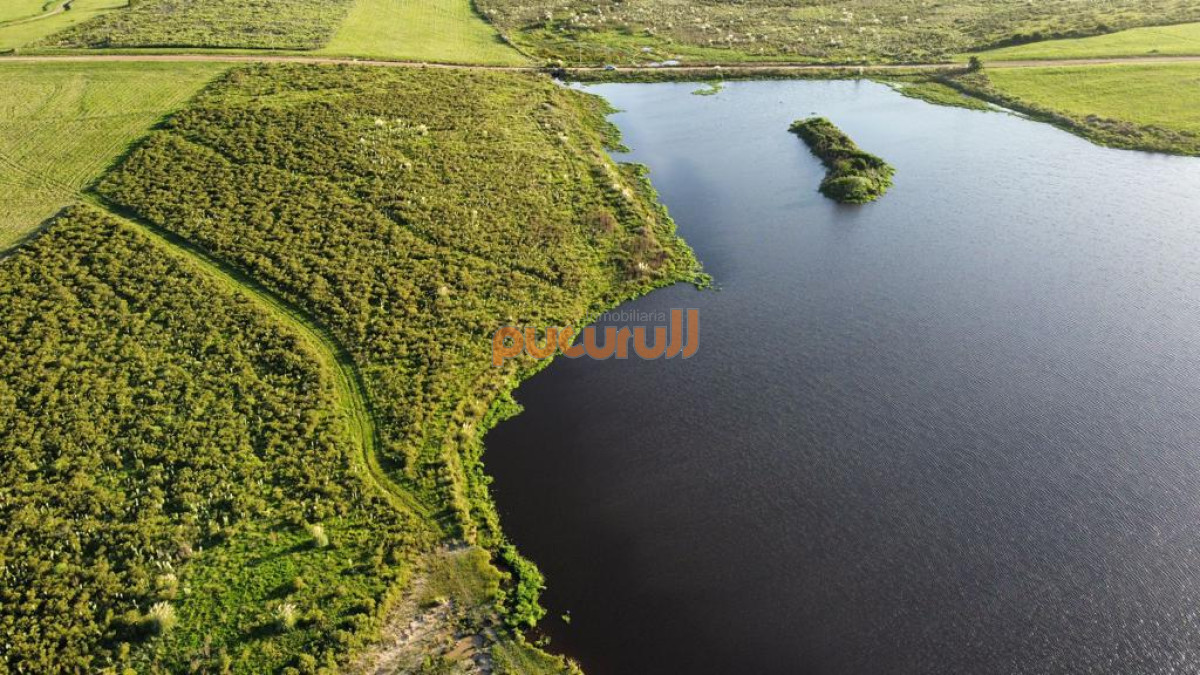 Campo Ref.3149 - Chacra con frente a laguna.