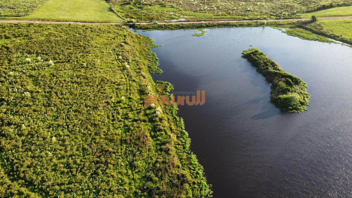 Campo Ref.3149 - Chacra con frente a laguna.
