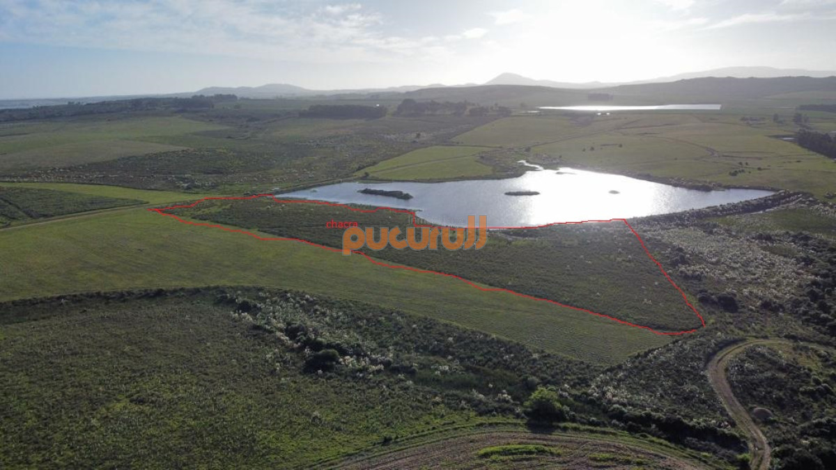 Campo Ref.3149 - Chacra con frente a laguna.