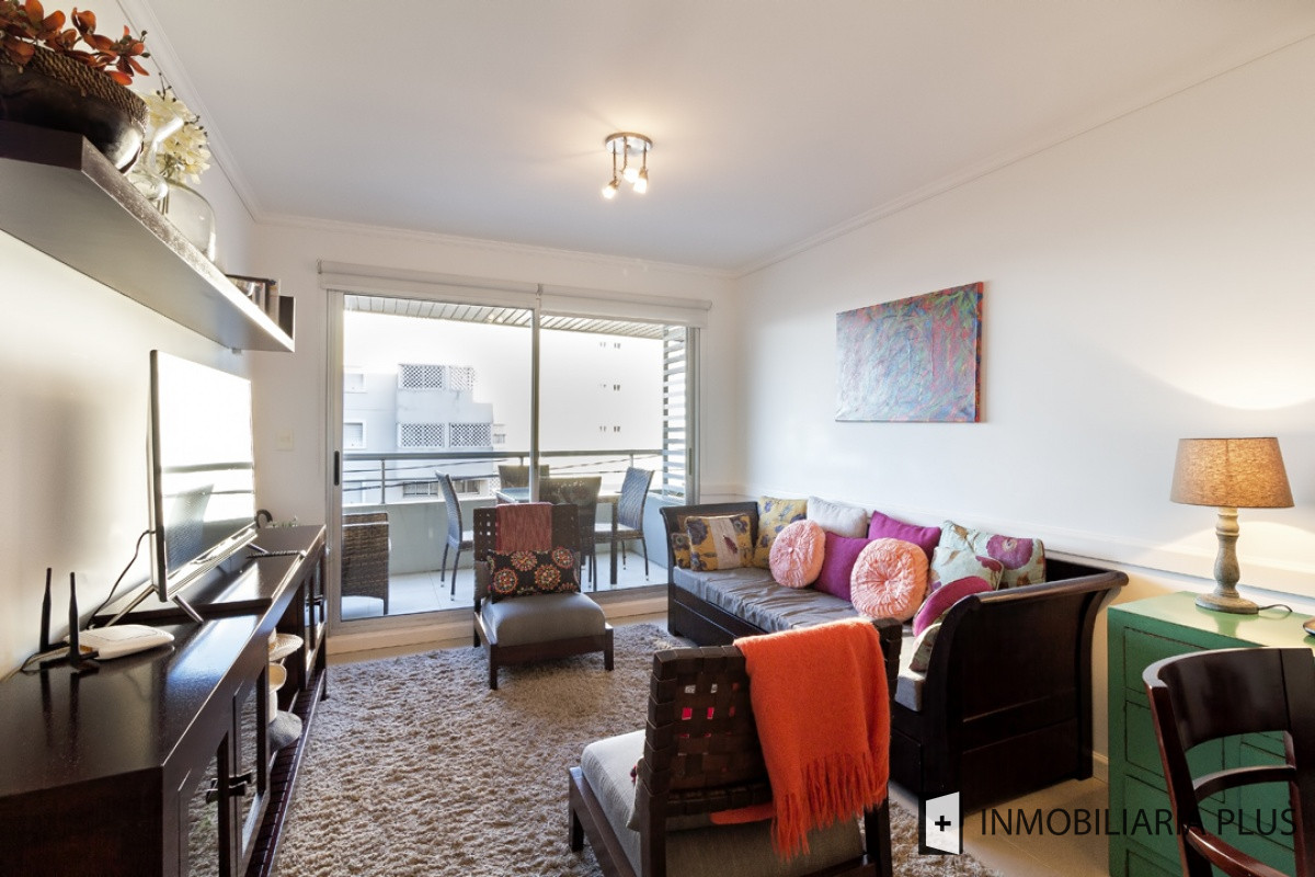 Apartamento ID.1054 - Venta de Apartamento con piscina, terraza, cochera, 2 dormitorios y 2 baños en La Península de Punta del este