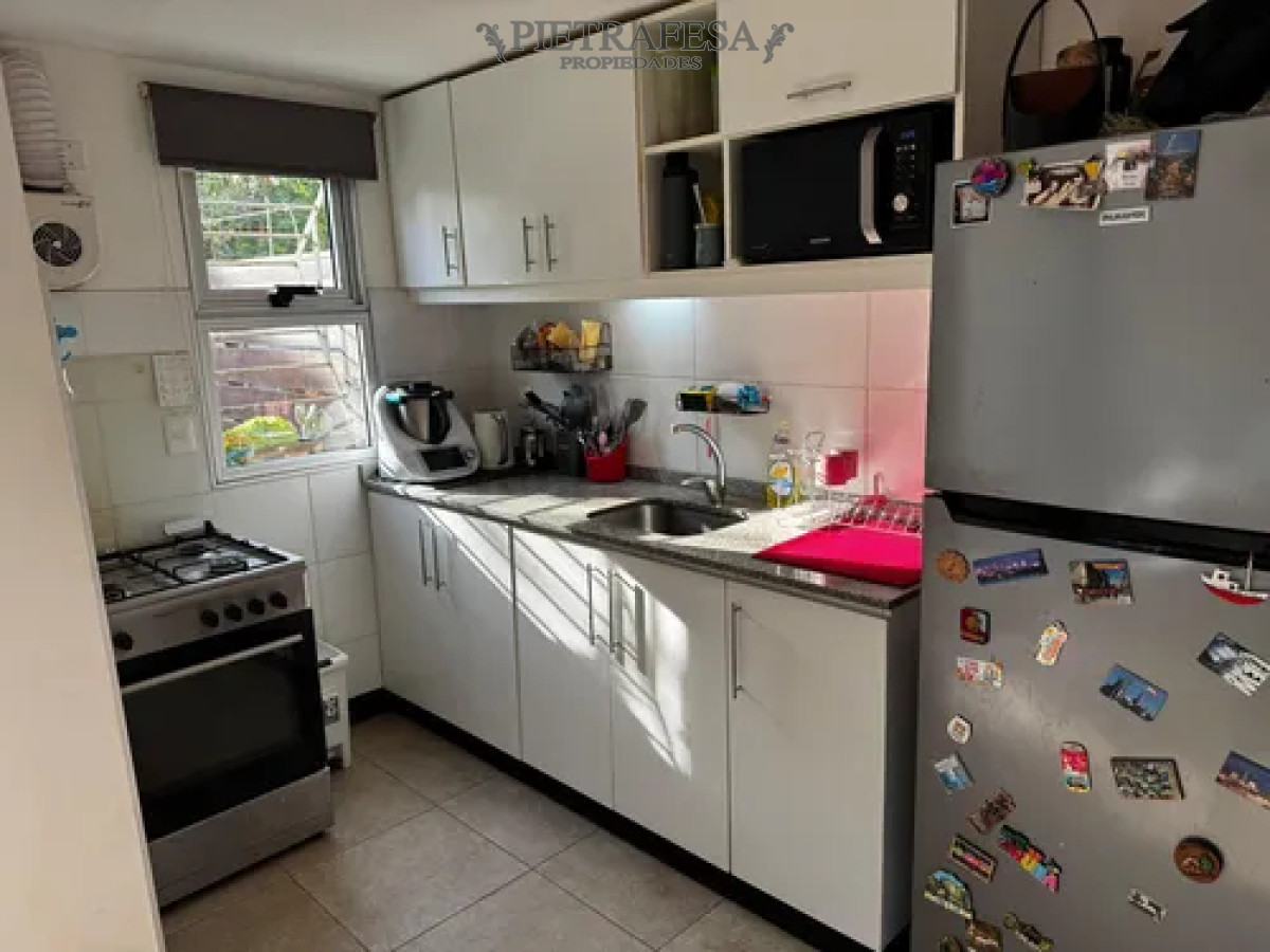 Apartamento ID.14511 - Apartamento en venta con renta tipo duplex, 2 dormitorios, 1 baño, patio con parrillero, cochera. San José de Carrasco.