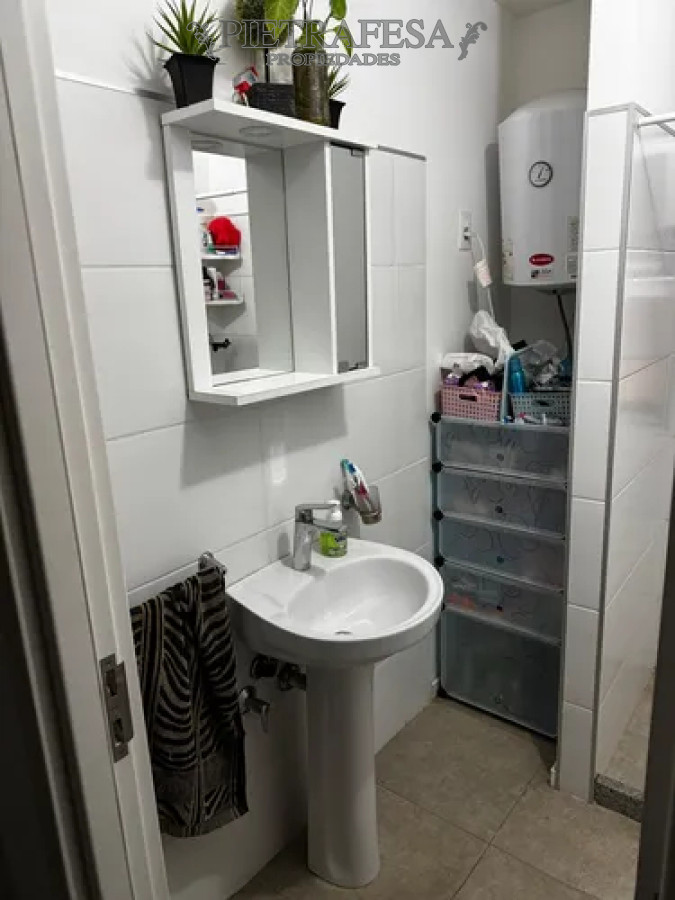 Apartamento ID.14511 - Apartamento en venta con renta tipo duplex, 2 dormitorios, 1 baño, patio con parrillero, cochera. San José de Carrasco.