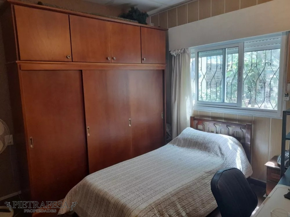 Casa ID.7157 - Casa en venta 3 dormitorios, 2 baños, fondo y garaje-Francisco Anzani-Buceo 