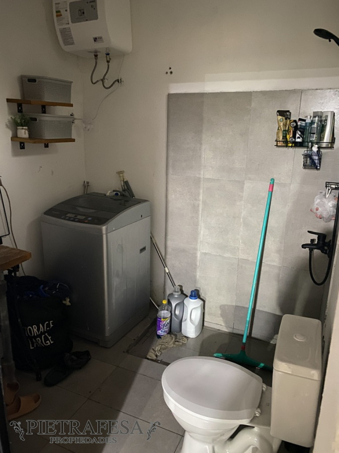 Casa ID.13135 - Casa en venta con renta, 2 dormitorios, patio-Cerro 
