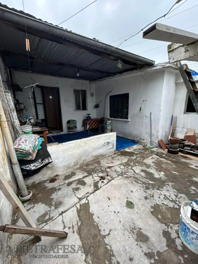 Casa ID.8716 - Casa en venta 2 dormitorios, 1 baño, fondo y cochera-Flor de Maroñas