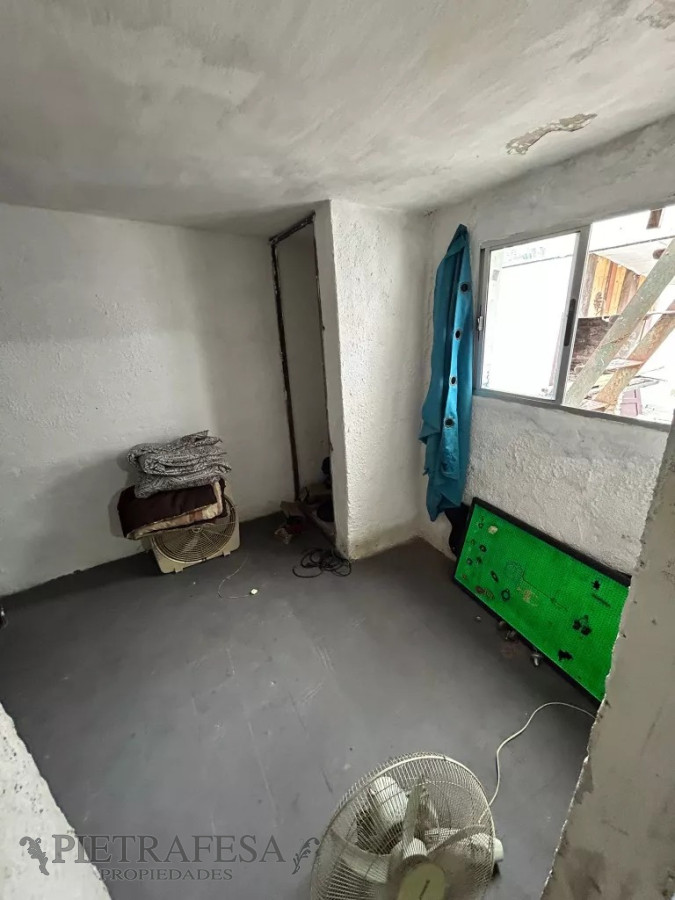Casa ID.8716 - Casa en venta 2 dormitorios, 1 baño, fondo y cochera-Flor de Maroñas