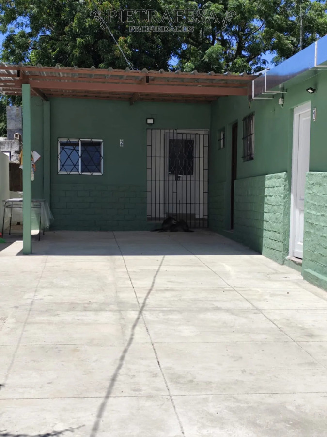 Casa ID.15131 - Casa en alquiler, 2 dormitorios, 1 baño, patio, cochera. La Teja.