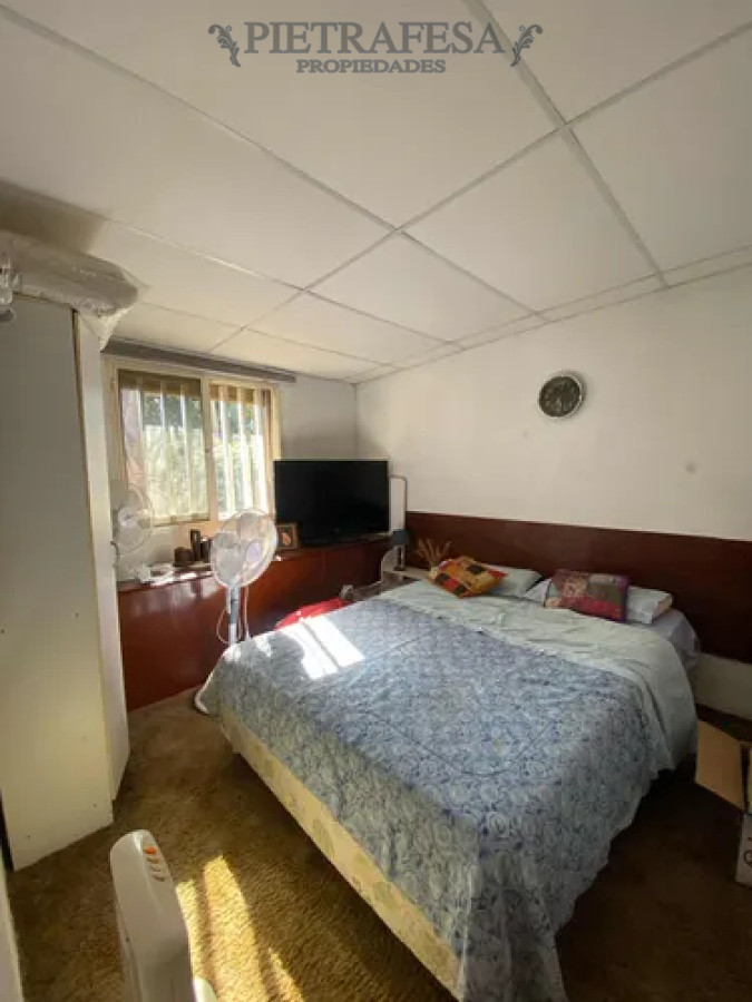 Casa ID.14069 - Casa en alquiler, 2 dormitorios, 1 baño, patio con parrillero. Jardines del Hipodromo.