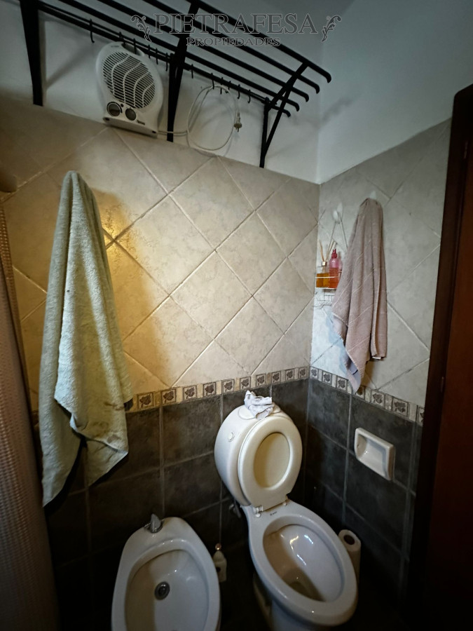 Casa ID.9588 - Casa en venta con renta,3 dormitorios,patio,cochera-Bolivar