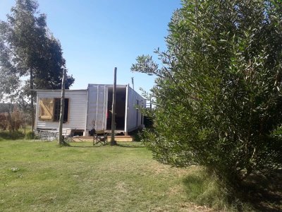 TERRENO CON VIVIENDA EN MIRAMAR ACRES