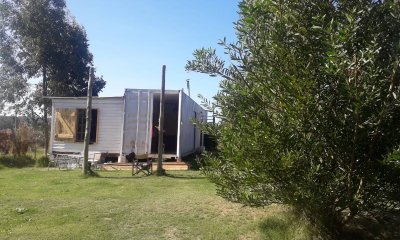 TERRENO CON VIVIENDA EN MIRAMAR ACRES