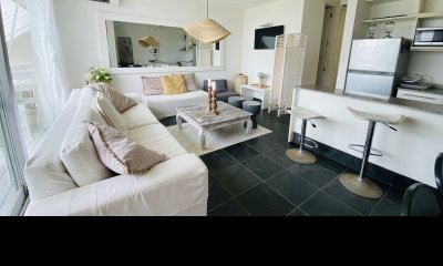 Venta departamento en Manantiales 2 dormitorios con patio y garaje