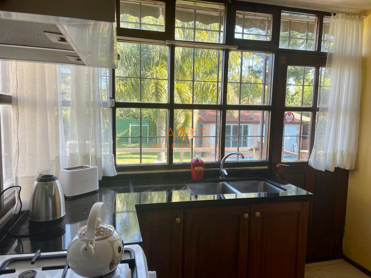 Casa ID.2216 - Completo quincho disponible en alquiler anual 
