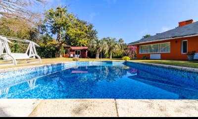 Oportunidad en el country, 5 dorm, piscina climatizada, 474 m2 construidos