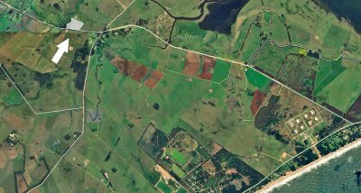 Chacra 5.82 ha, sobre camino Medellín.