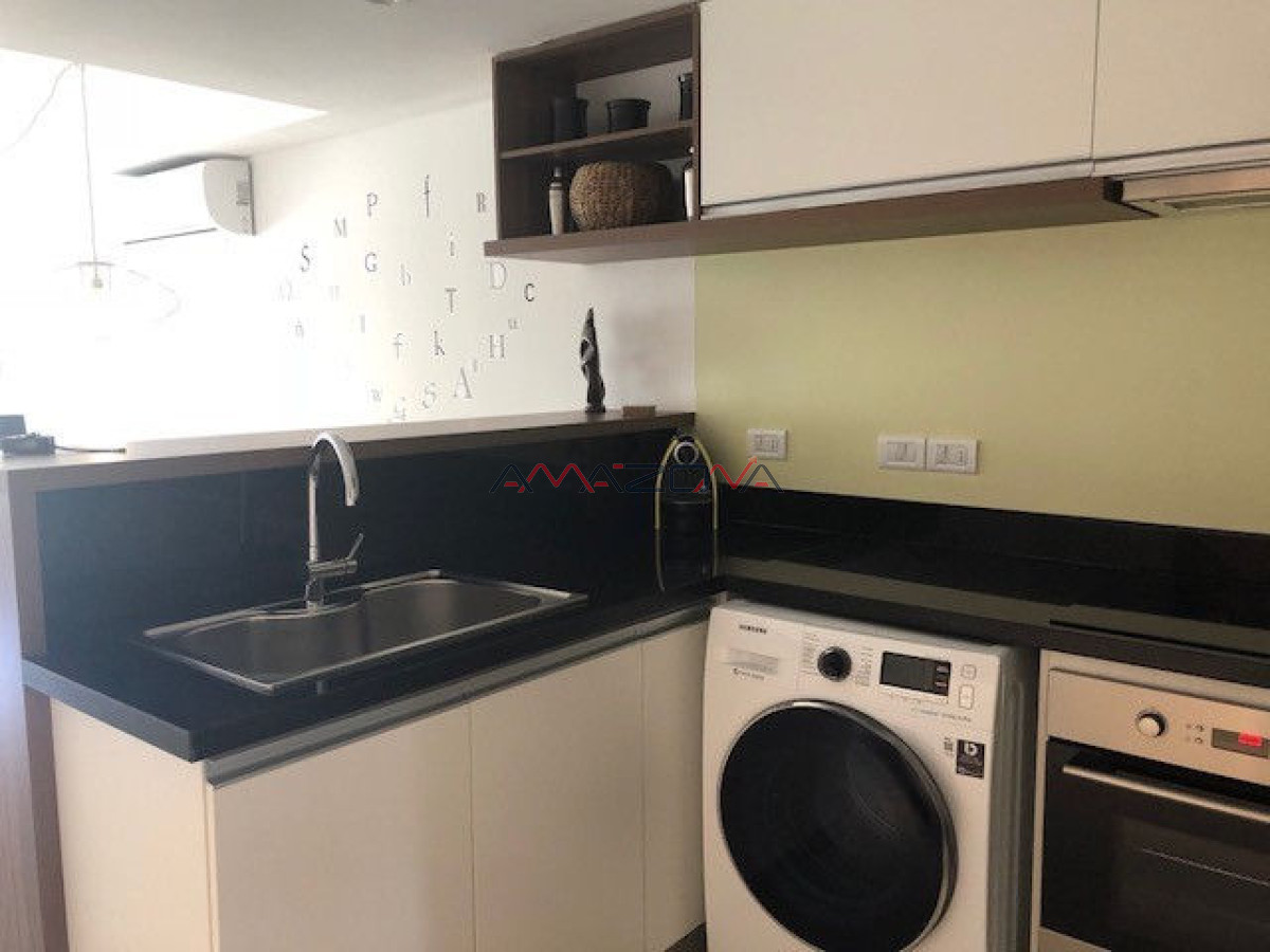 Apartamento ID.5025 - Apto 2 dorm, central, 2 baños y balcón piso bajo. 
