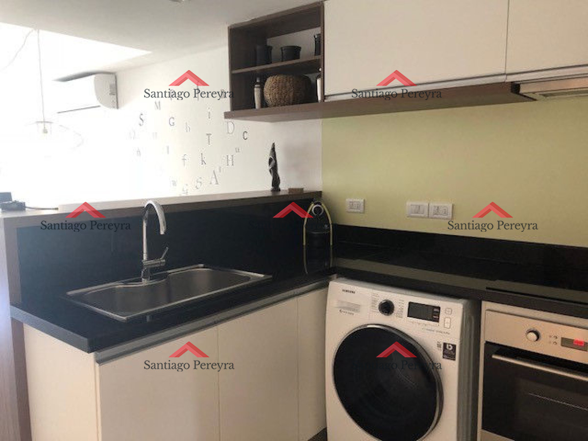 Apartamento ID.13324 - Apto 2 dorm, central, 2 baños y balcón piso bajo. 