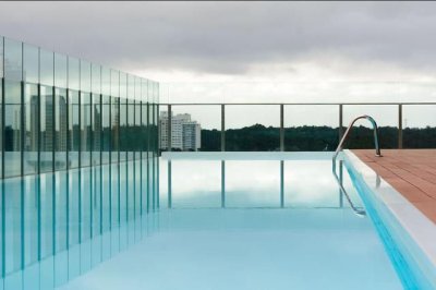 Un dormitorio y medio con vista a Playa Mansa