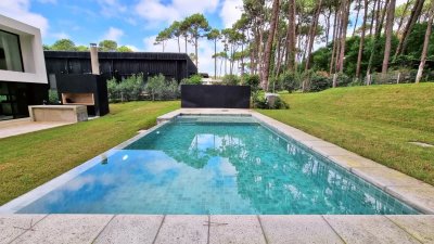 Casa a Estrenar en Barrio Privado. 4 Suites, Piscina climatizada, losa radiante.