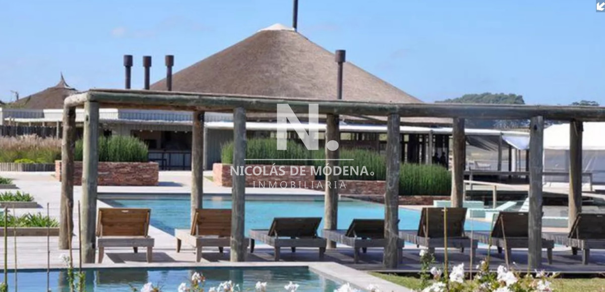 Terreno en venta en barrio cerrado Pueblo Mio. Manantiales. - NDM10938T