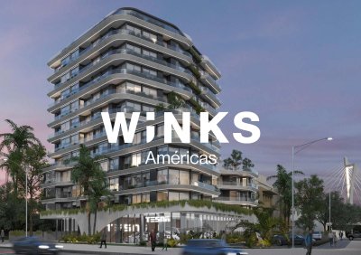 Monoambiente frente Av. de las Américas con vista despejada.