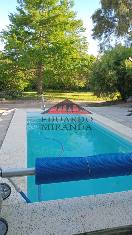 muy linda casa con piscina climatizada para descanso temporal 4 dormitorios tres baÑos living comedor cocina comedor barbacoa parrilla gran parque. - emp219c