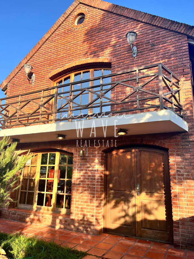 Casa ID.4714 - Casa en alquiler temporal en Manantiales, 4 dormitorios.