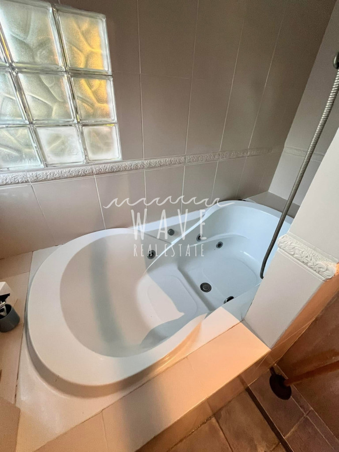 Casa ID.4714 - Casa en alquiler temporal en Manantiales, 4 dormitorios.