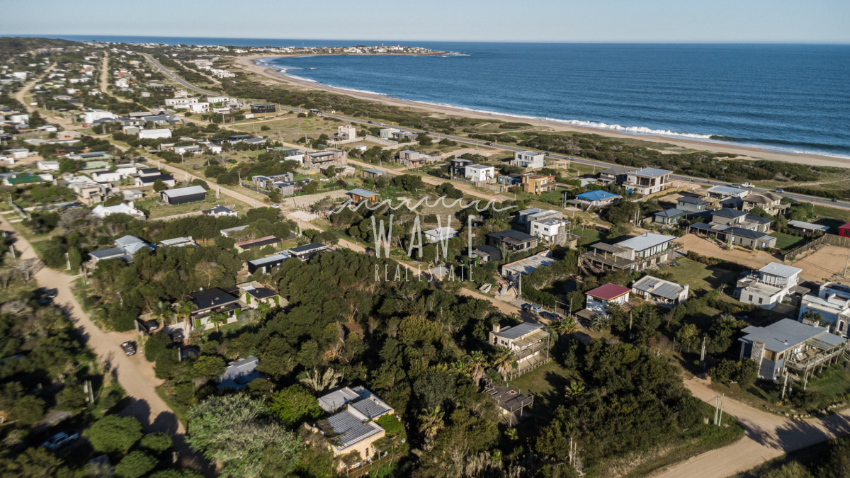 Terreno ID.5397 - Venta Lote La Juanita Vista Parcial laguna y mar 