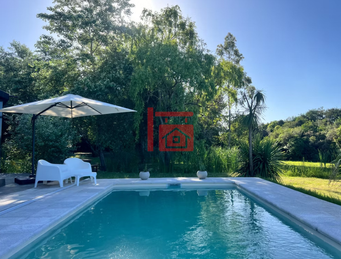 Chacra ID.580 - Chacra con Piscina Climatizada - Naturaleza, Confort y Diseño en un Solo Lugar