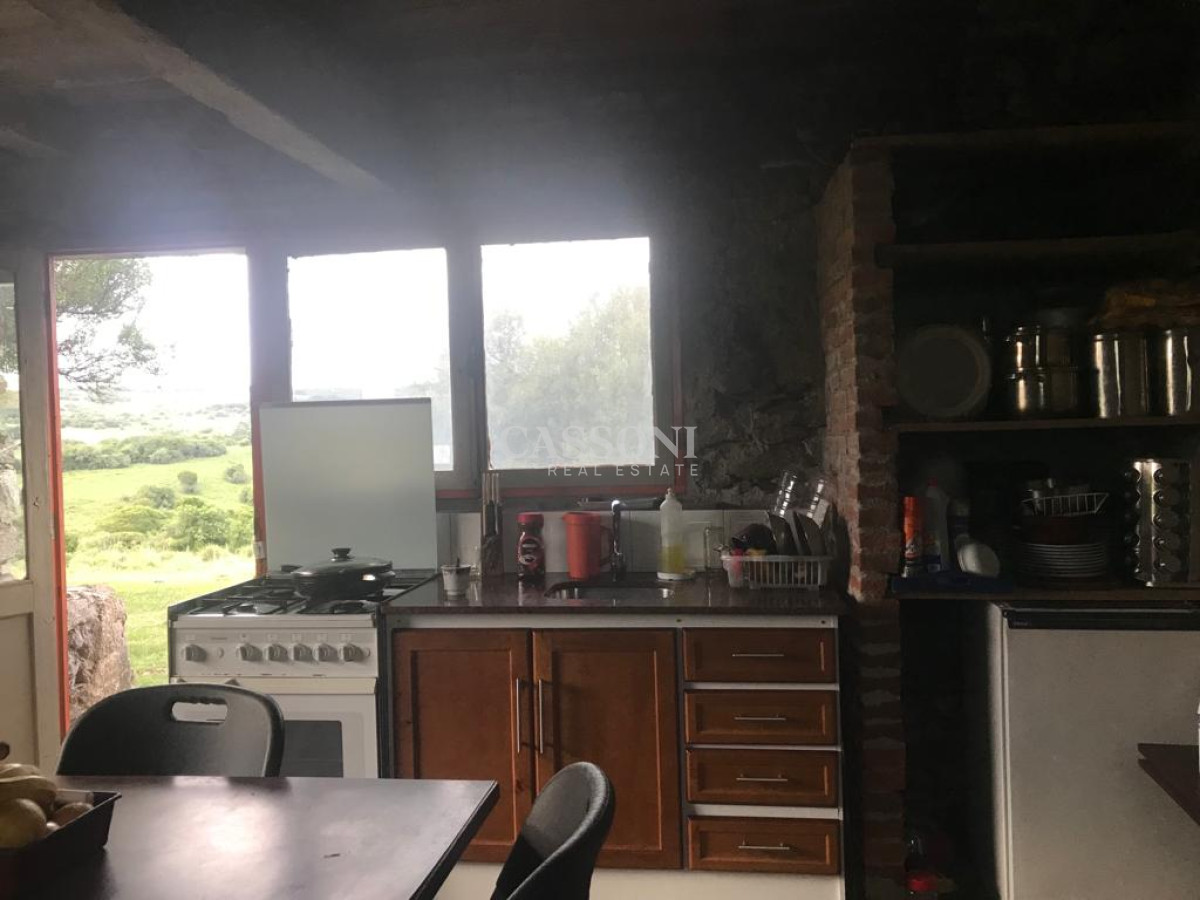 Chacra ID.3953 - MUY LINDO CAMPO EN GARZÓN CON FINCA  DE 2 DORMITORIOS