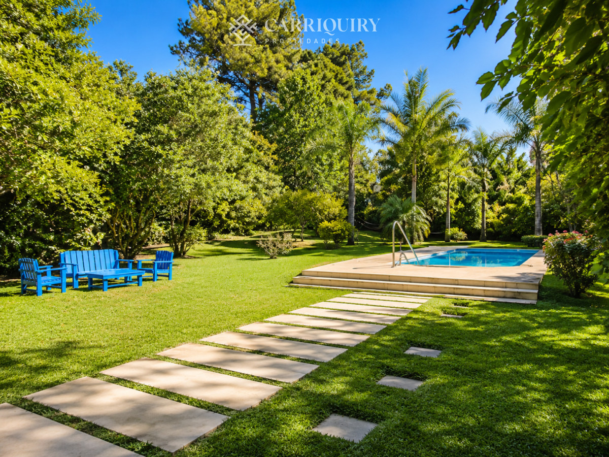 Casa ID.10469/Casa-de-categoría-en-Playa-Mansa-a-800-metros-del-mar,-5-Dormitorios,-Piscina-Climatizada-y-Barbacoa.-Punta-del-Este - Moderna Casa de 4 Dormitorios con Piscina Climatizada y Barbacoa en Punta del Este