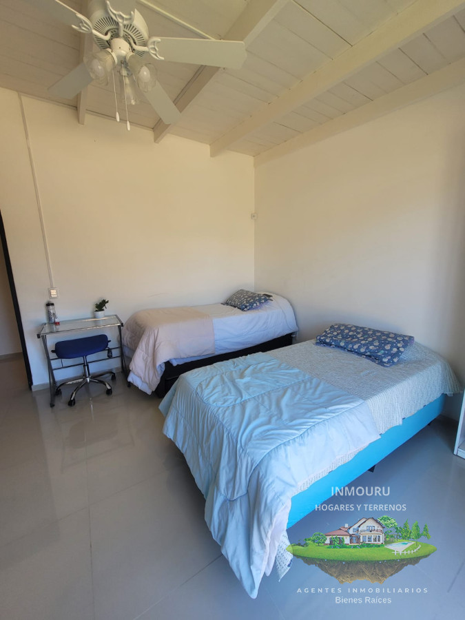 Casa ID.809 - Casa de 3 Dormitorios con piscina en barrio cerrado, entre Punta Ballena y Maldonado