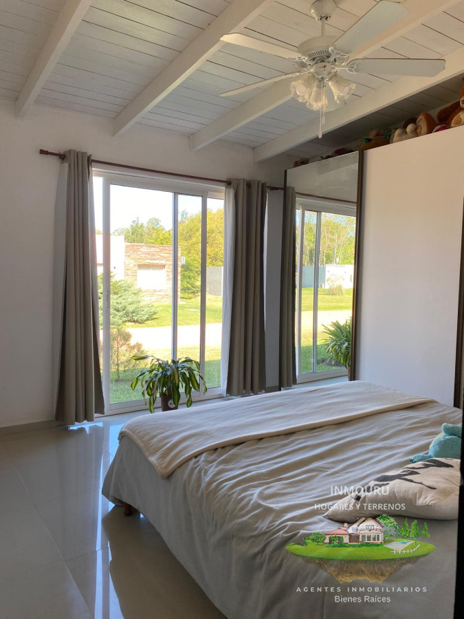 Casa ID.809 - Casa de 3 Dormitorios con piscina en barrio cerrado, entre Punta Ballena y Maldonado