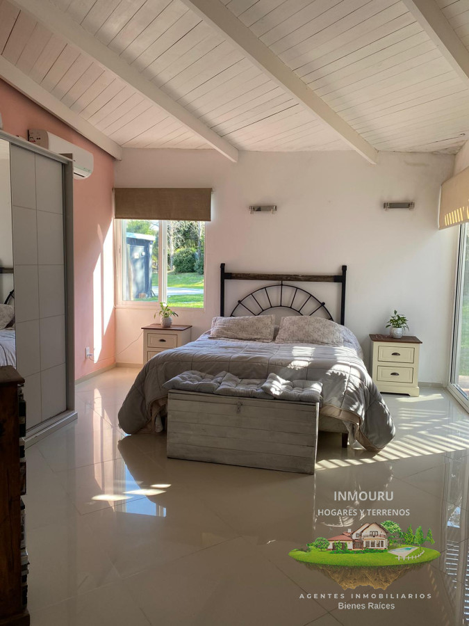 Casa ID.809 - Casa de 3 Dormitorios con piscina en barrio cerrado, entre Punta Ballena y Maldonado
