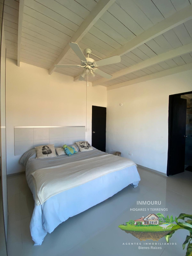 Casa ID.809 - Casa de 3 Dormitorios con piscina en barrio cerrado, entre Punta Ballena y Maldonado
