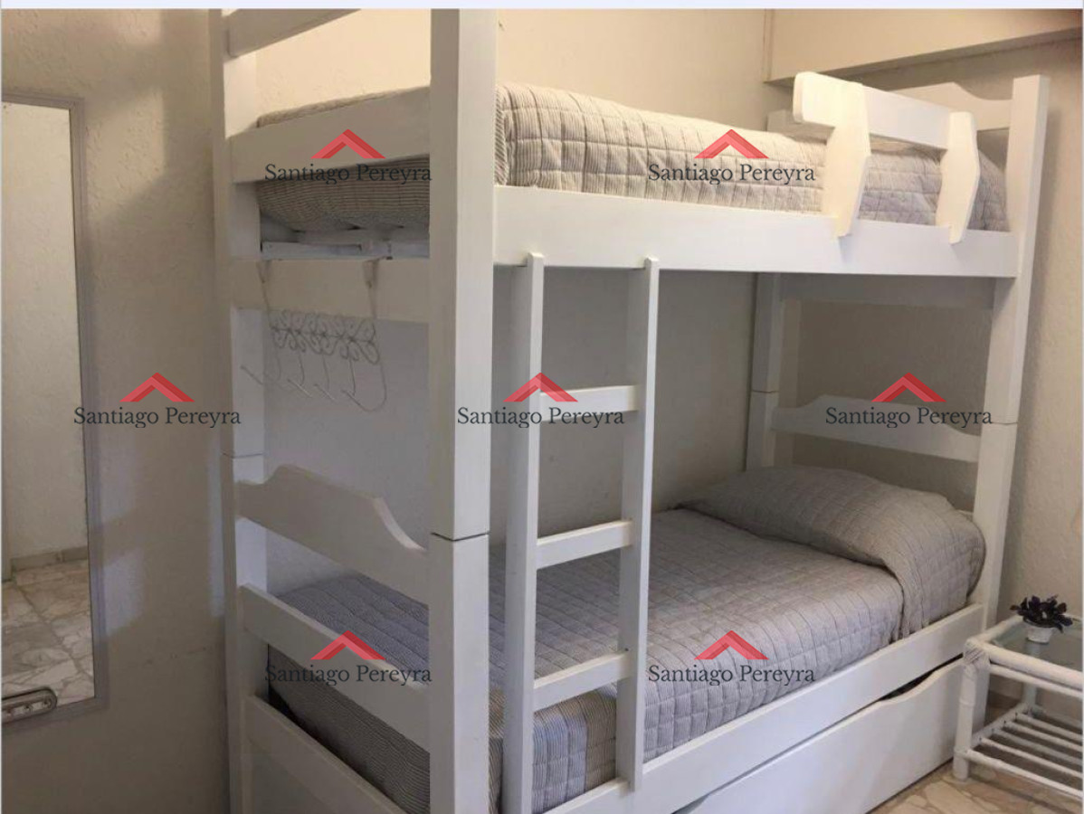 Apartamento ID.16384 - Apartamento 3 dormitorios con estufa a leña y parrillero primera linea Playa Mansa