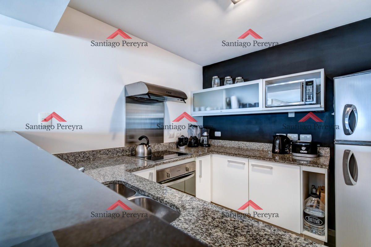 Apartamento ID.14184 - Apartamento primer nivel en venta, 2 dormitorios en suite, amenities completos, a pasos de la playa en piso alto