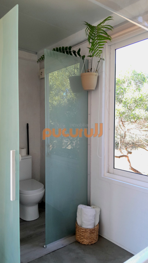 Casa ID.2117 - Mini loft con patio privado.