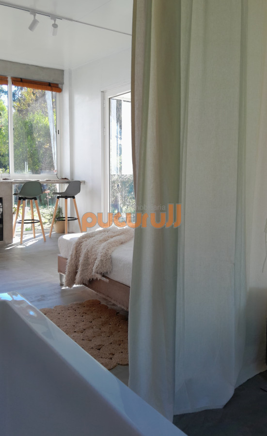 Casa ID.2117 - Mini loft con patio privado.